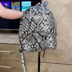 snakeskin backpack
